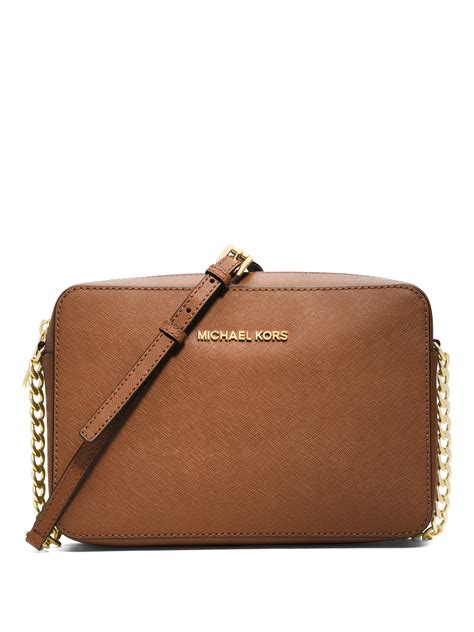 michael kors jet set travel cross body bag|Michael Kors bag with airplanes.